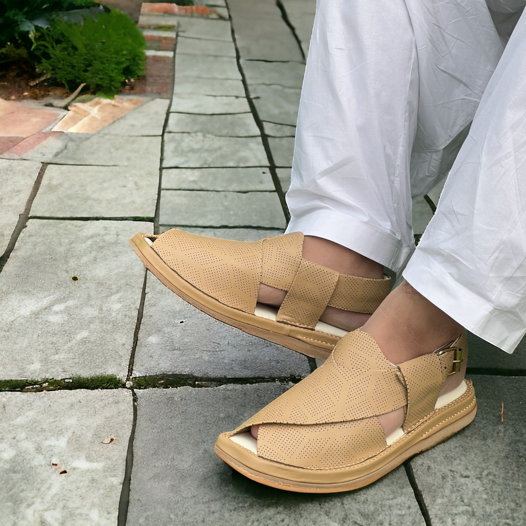 Beige sandals worn on a stone pavement