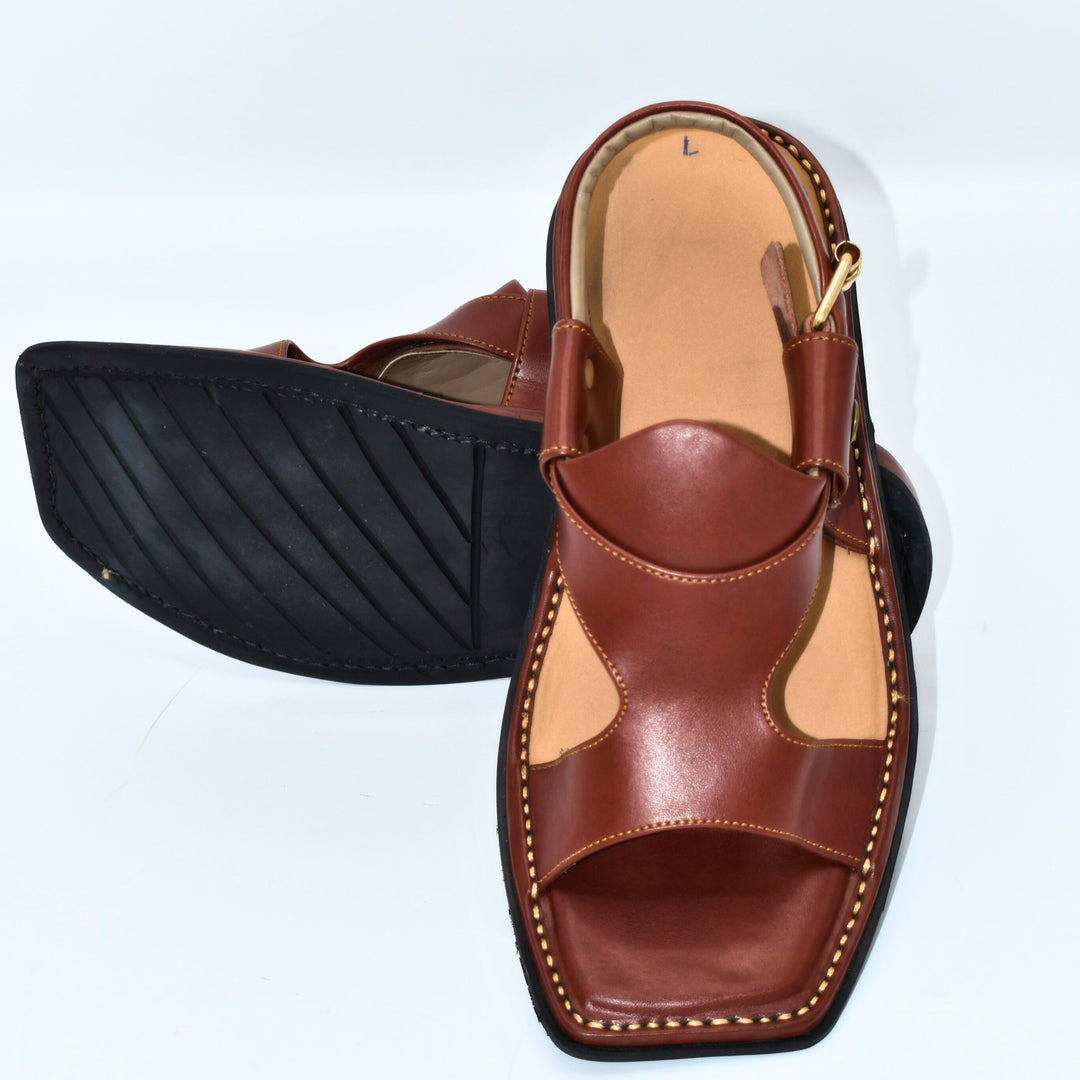Brown sandal with open toe design on a white background